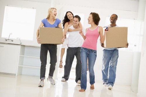 Moving van and removal team working in a Kensington residential street