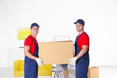 Workers and moving equipment representing ethical labour standards