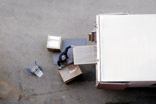 Packed boxes and furniture prepared for a Kensington flat move