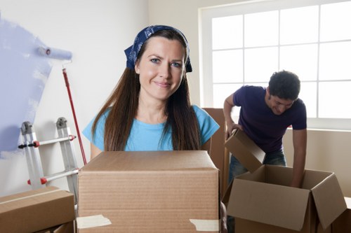 Local movers preparing items for transport in Kensington