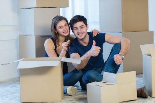 Removals team loading furniture for a Kensington apartment relocation