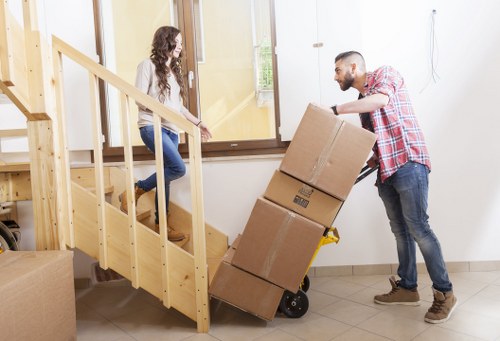Loading furniture into a van for a Kensington move