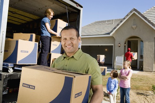 Household boxes and furniture prepared for removals in Kensington